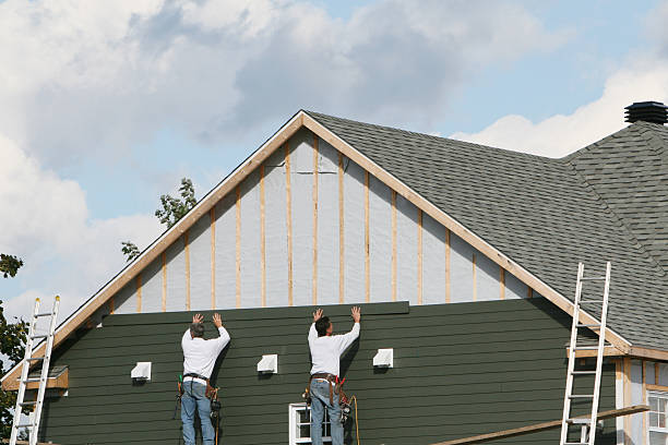 Professional Siding Installation technician working in Charlestown, IN